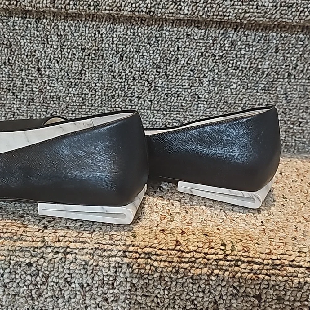 Calvin Klein Black Pointed Toe Flats with Silver Accent Heel
